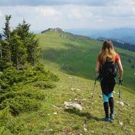 A girl is hiking in the Monferrato region