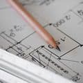 Sharp pencil lies on a printout of a mathematical calculation