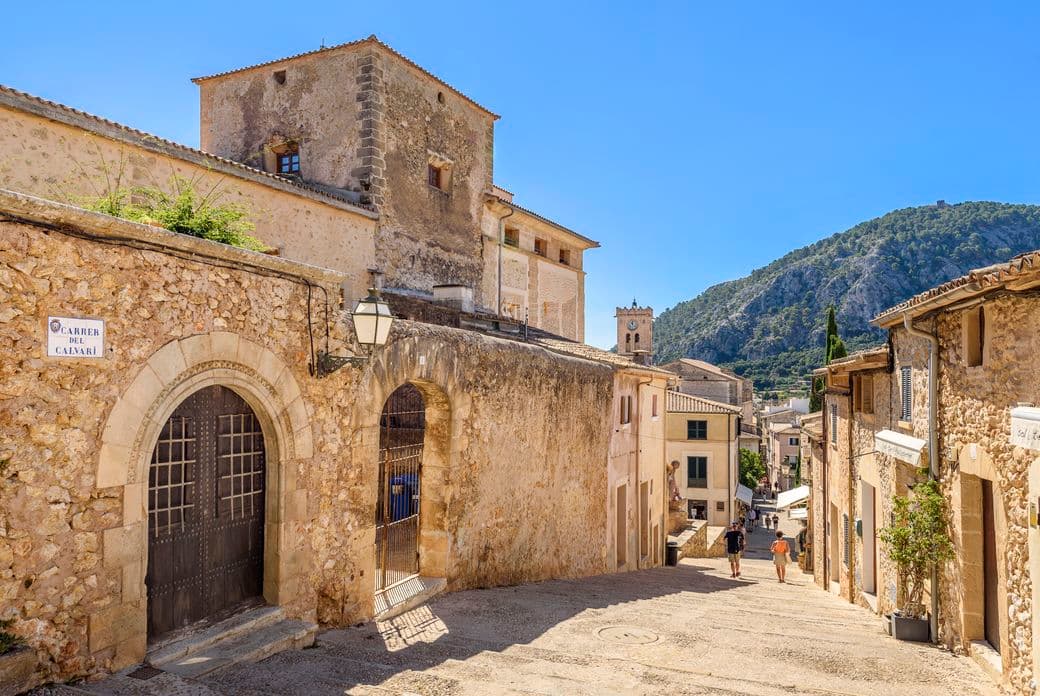 Scenic view of Pollensa’s old town with the Calvari hill in the background