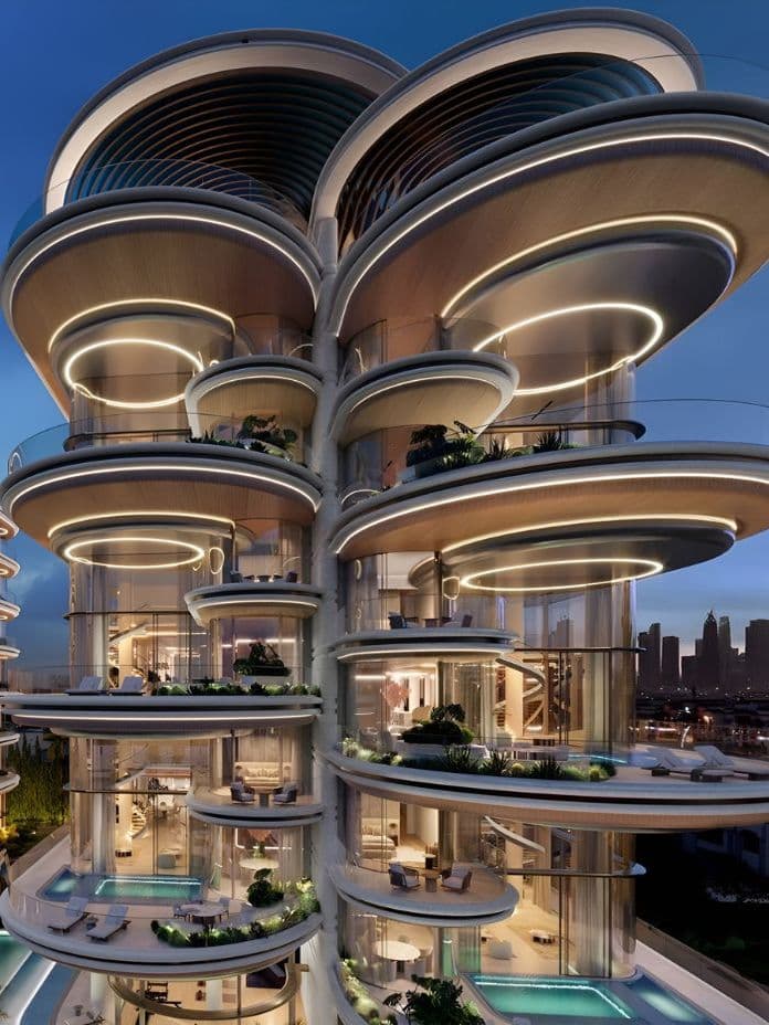 Futuristic multi-story building with circular balconies, large glass windows, and illuminated rings, set against a city skyline at dusk.