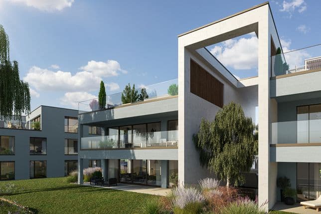 Modern new-build project with various residential units with a garden seating area