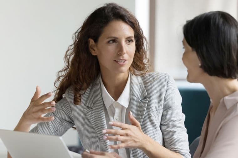 Real estate agent meeting client to discuss the benefits of an exclusive listing agreement