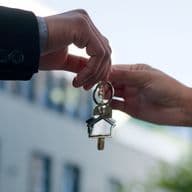 handing over keys after a quick property sale