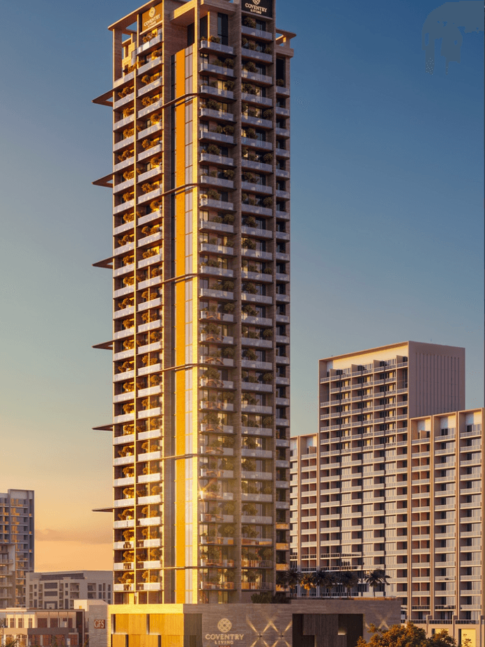 Coventry Living residential tower in JVC featuring glass-fronted balconies, warm architectural finishes and city views.