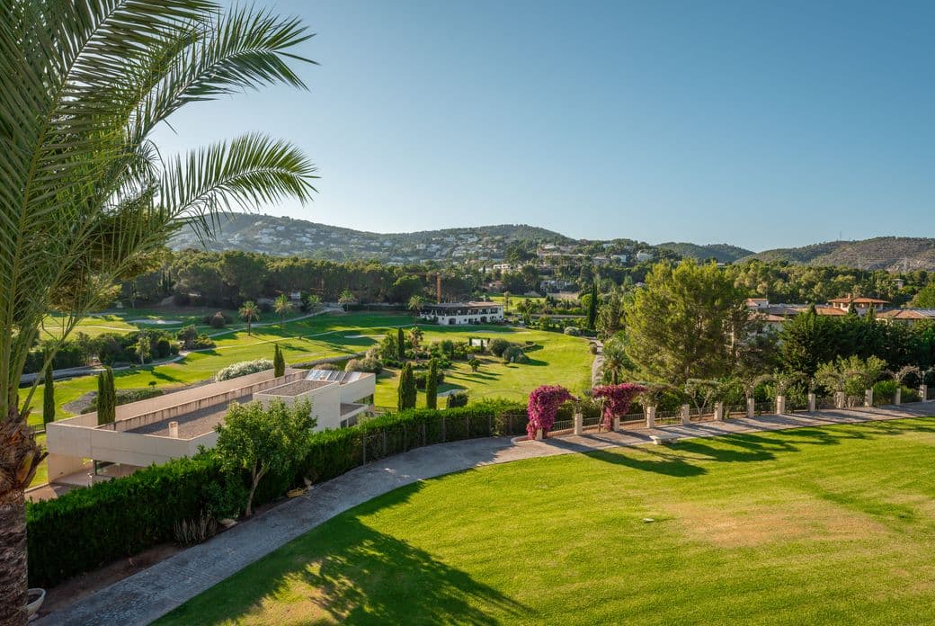 Aerial view of gardens and golf course in Son Vida
