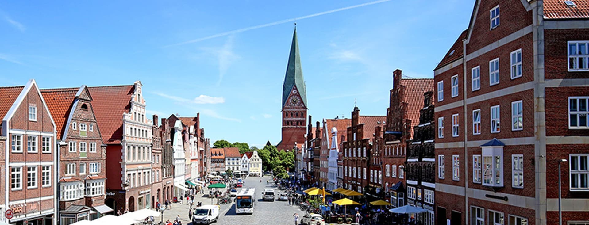 Lively old town of Lüneburg with cafés, red-brick buildings and real estate in a sought-after central location