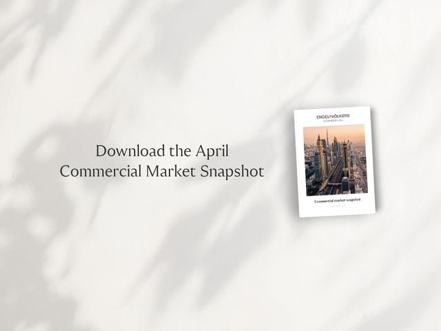 Text reads: "Download the April Commercial Market Snapshot" with a cover image featuring a city skyline.