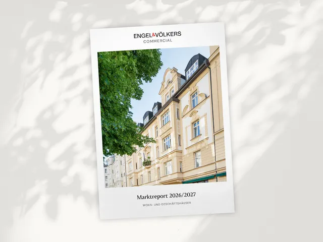 Cover page of Engel & Völkers Commercial Marktbericht 2026/2027, showing a beige ornate building with a leafy tree in the foreground.