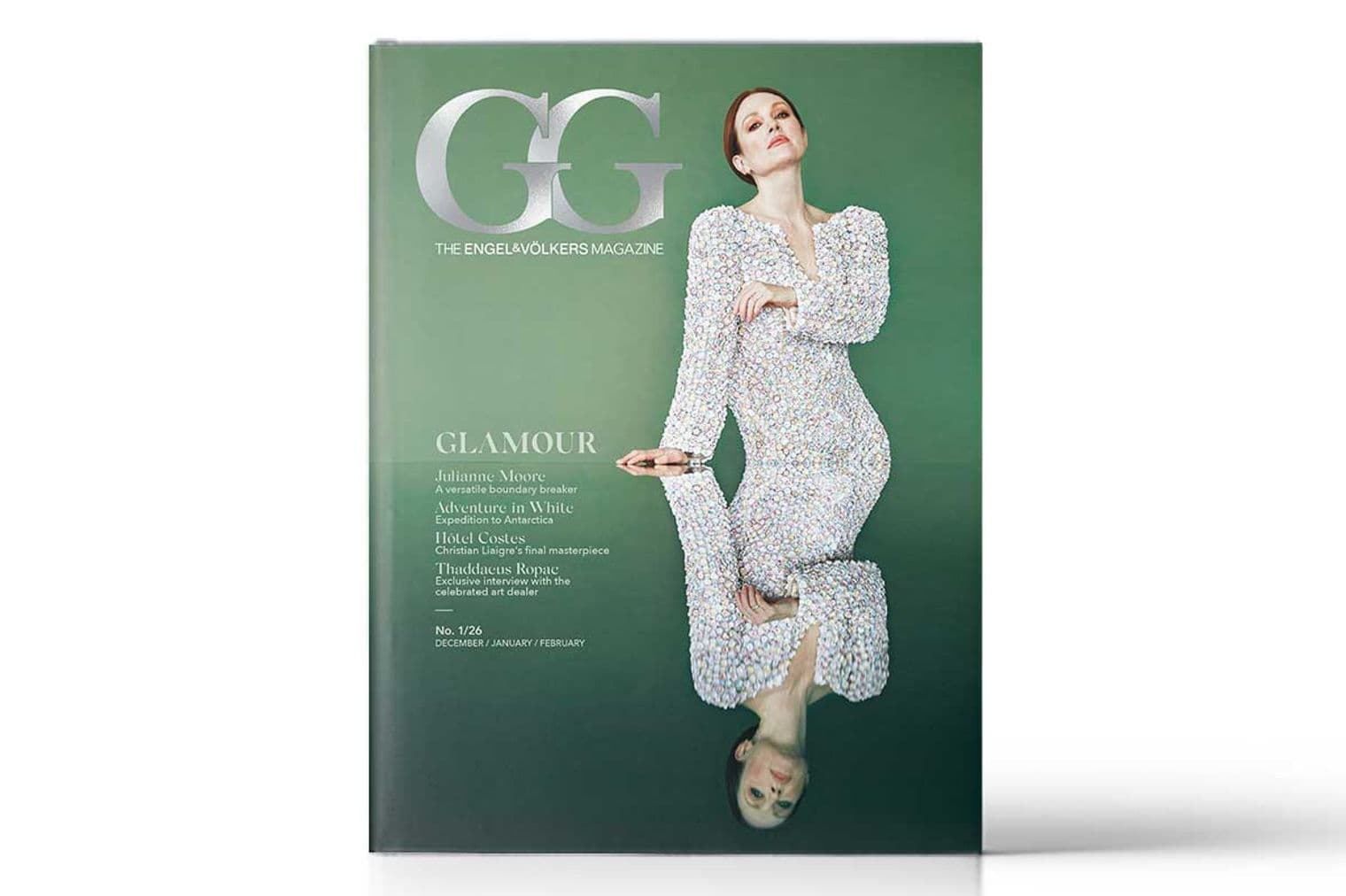 Engel & Völkers magazine cover featuring Julianne Moore in a white dress against a green background with a mirrored reflection.