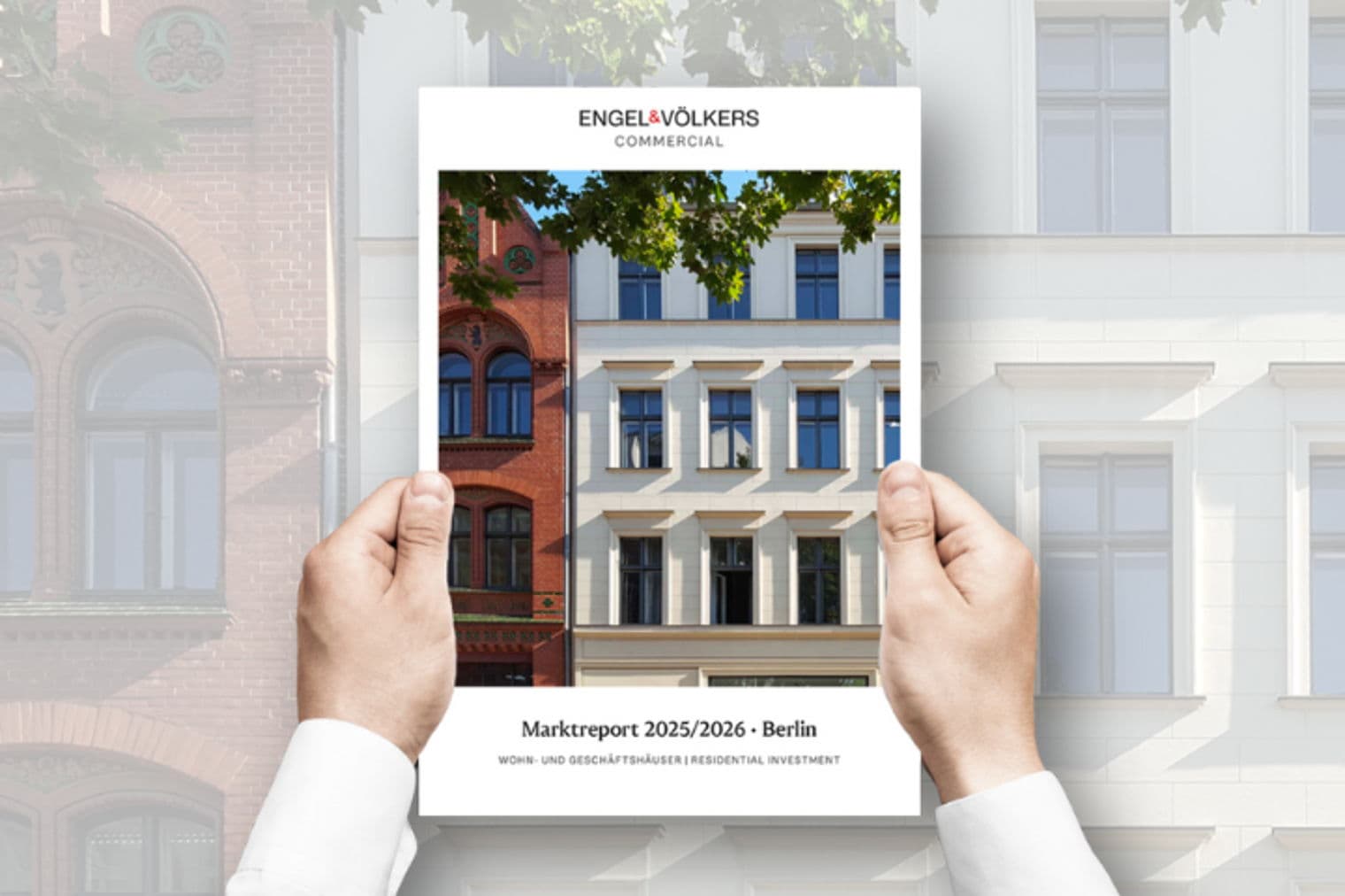Hands hold a report cover with a building photo. "Engel & Völkers Commercial" logo at the top. Text reads "Marktreport 2025/2026 Berlin."