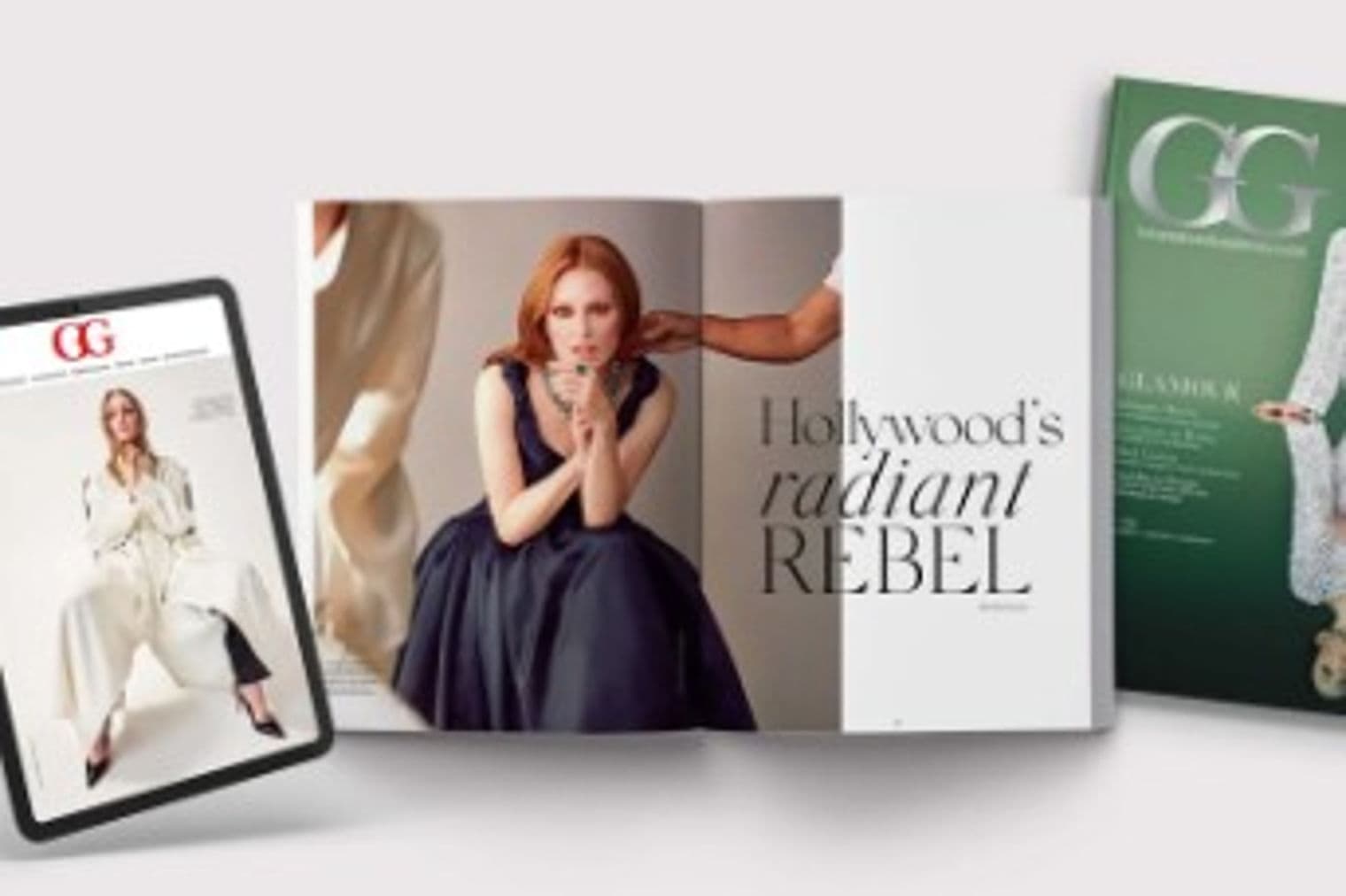 Magazine spread featuring a red-haired woman in a navy dress, titled "Hollywood's Radiant Rebel," with a tablet and magazine cover nearby.