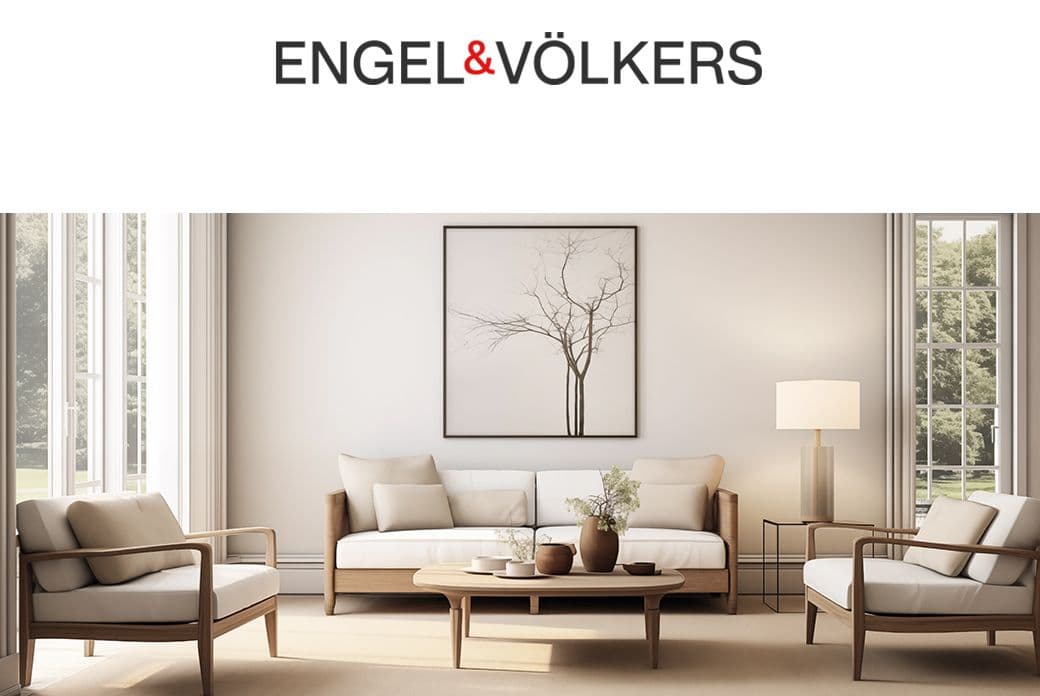 Engel & Völkers presents a bright living room with a sofa, chairs, and a tree art piece.