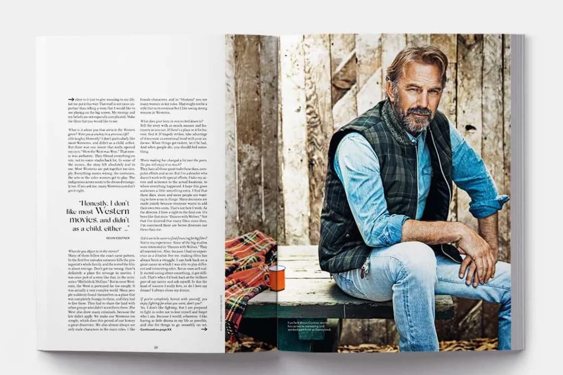 Open magazine with text on the left; right page shows a bearded man in a blue shirt and vest sitting on a wooden bench outdoors.