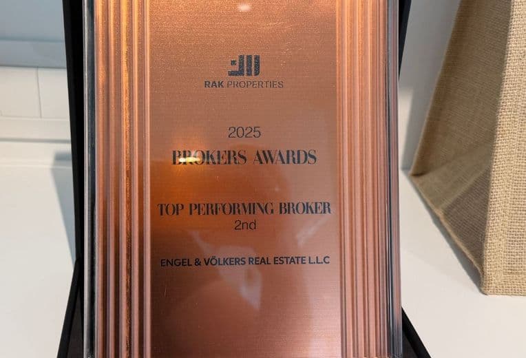 Bronze plaque with "RAK Properties, 2025 Brokers Awards, Top Performing Broker, 2nd, Engel & Völkers Real Estate LLC" engraved.