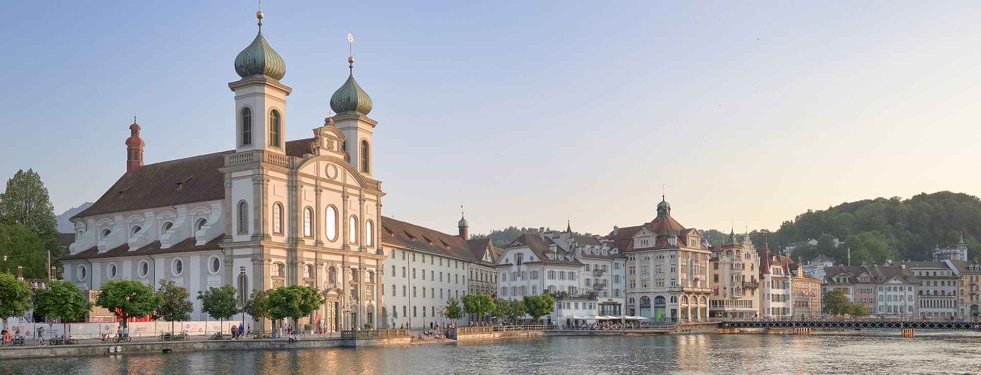 Jesuit church in the old town of Lucerne at dusk directly on the lake
