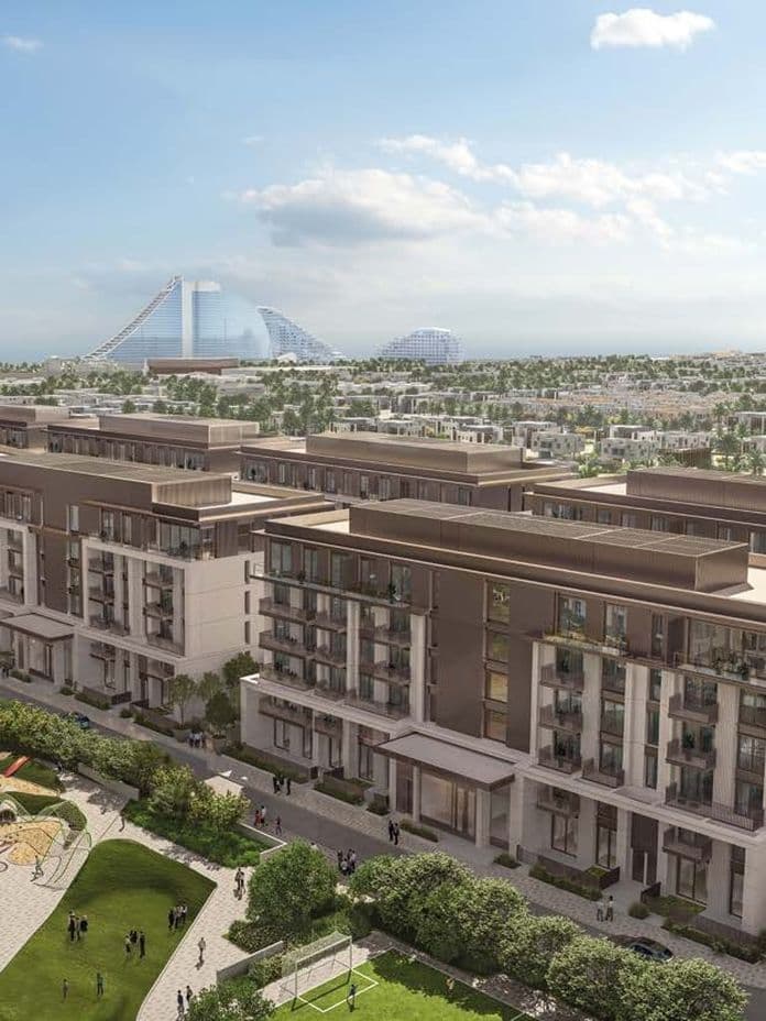 Aerial view of a modern residential complex with landscaped gardens, surrounded by cityscape and iconic architectural landmarks in the background.