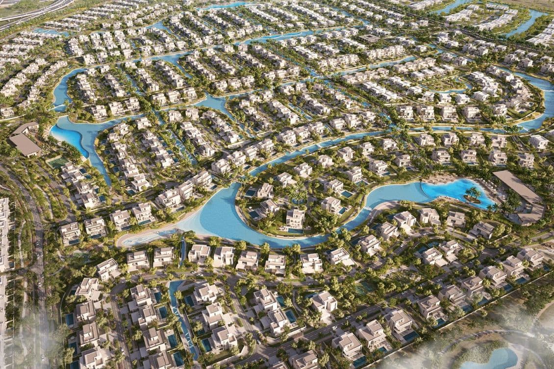Comprehensive aerial master plan of Palmiera Collective at The Oasis by Emaar, showcasing the expansive network of water canals, lagoons, and luxury villa clusters in Dubailand.