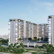 Modern residential complex with multiple high-rise buildings, featuring geometric facades, greenery, and surrounding roads and landscaping.