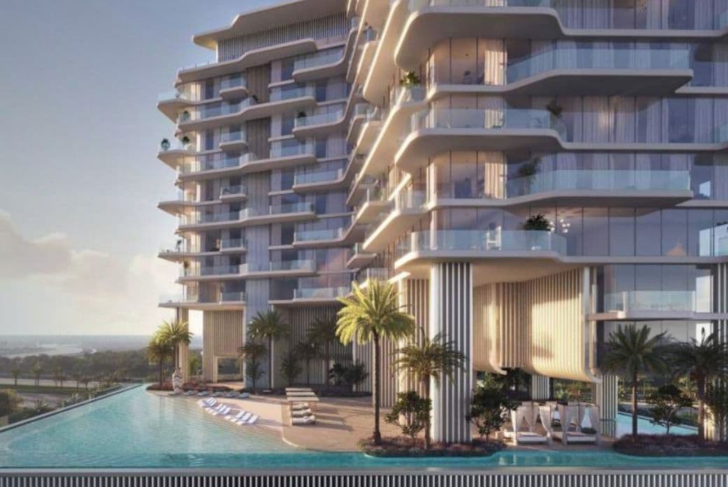 Rooftop swimming pool and sun deck at Octa Isle overlooking Dubai Islands and the sea