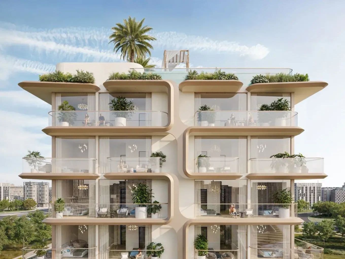 Modern multi-story building with curved balconies, glass railings, and rooftop greenery. Cityscape visible in the background under a blue sky.