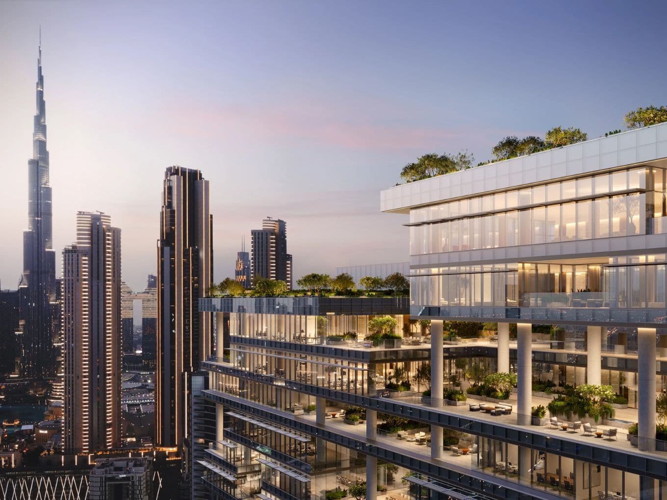 Modern high-rise building with greenery on terraces, set against a city skyline featuring the Burj Khalifa at sunset.