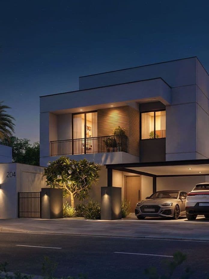 Modern house at night with palm trees, illuminated windows, and two cars parked in a driveway. A crescent moon is visible in the sky.