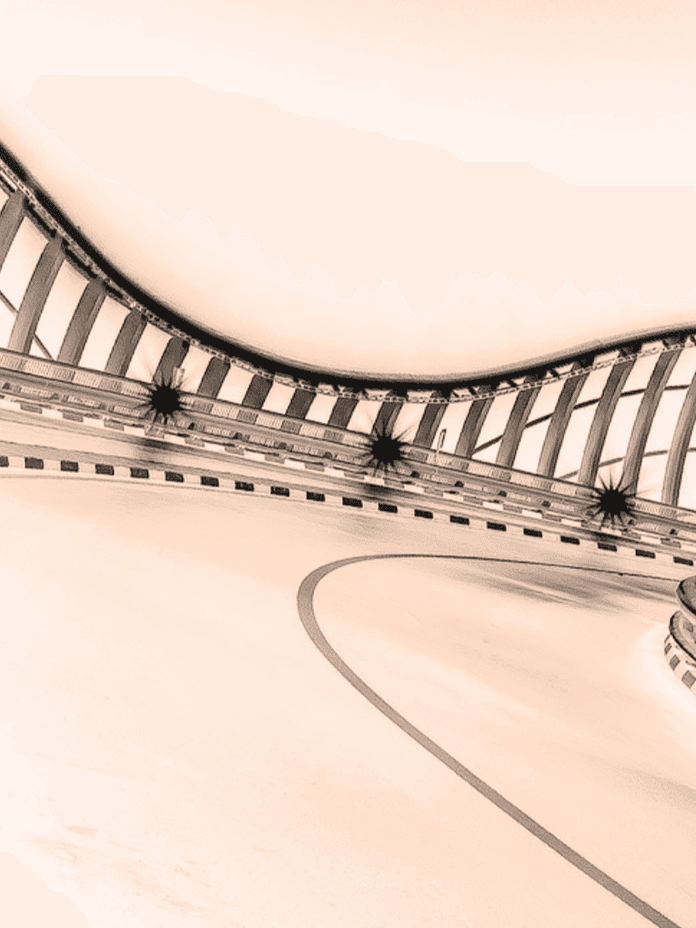 Curved architectural structure with large windows and a winding pathway inside, featuring a sepia-toned filter.