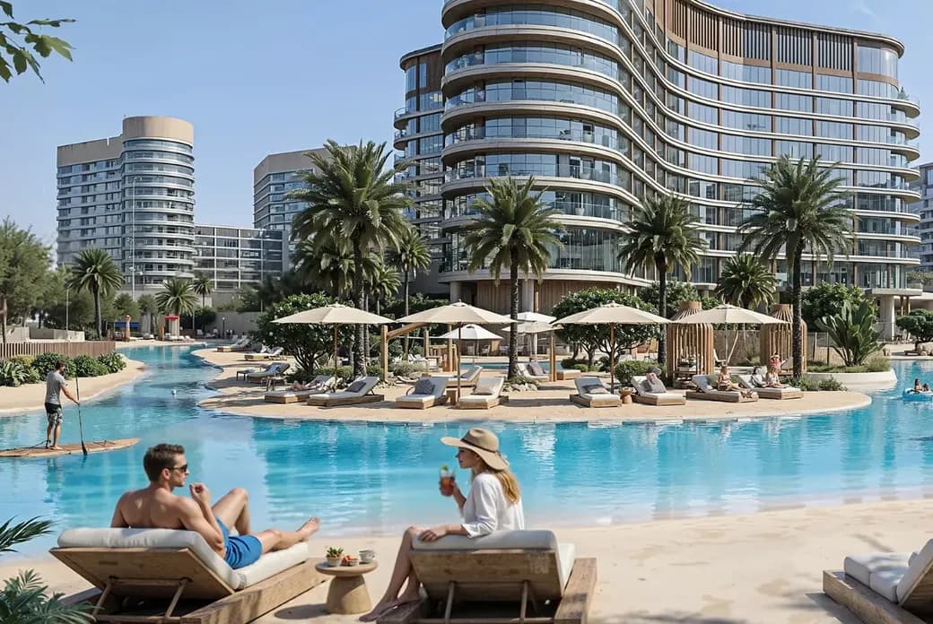 Modern beachfront complex with curved glass buildings, palm trees, and a large pool. People relax on lounge chairs and swim under clear skies.