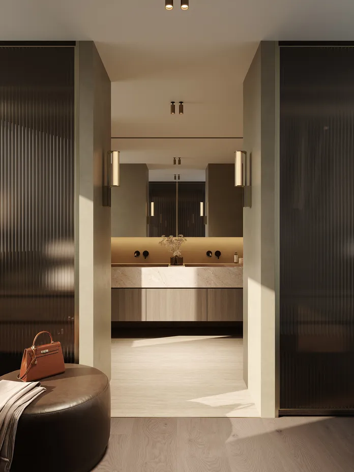 Blick in ein modernes, luxuriöses En-Suite Badezimmer und Kleiderschrank.