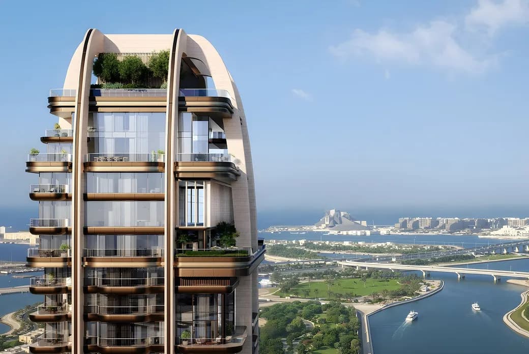 A modern curved high-rise with glass balconies and greenery, overlooking a coastal city with canals and bridges under a clear blue sky.