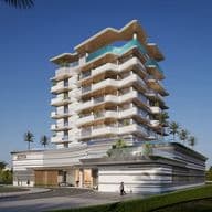 Modern multi-story building with balconies, rooftop pool, and minimalist design, surrounded by palm trees and clear blue sky.