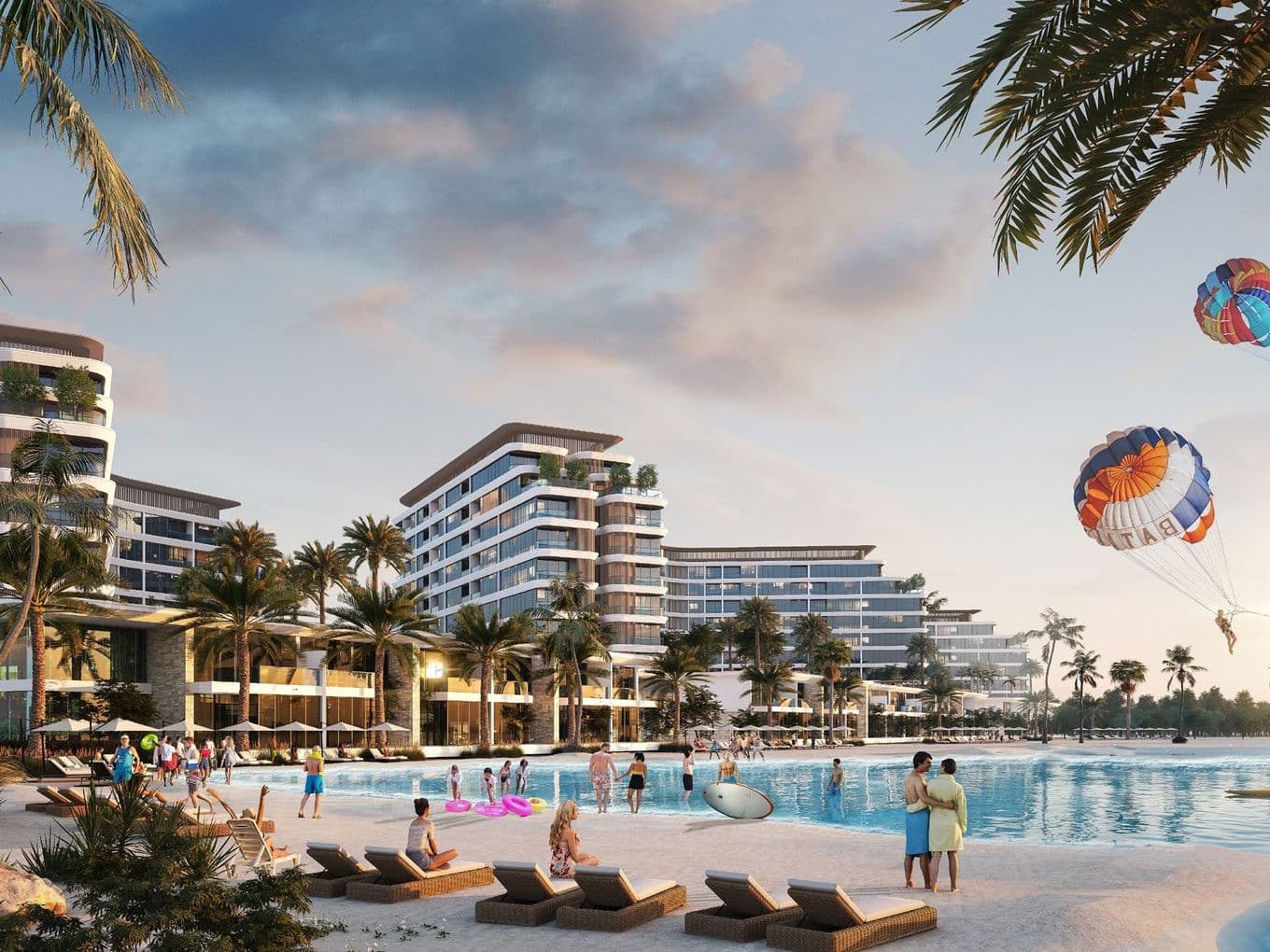 Beach resort with modern buildings, palm trees, people relaxing, parasailing, and a sunset sky. Families and couples enjoy the sandy shore.