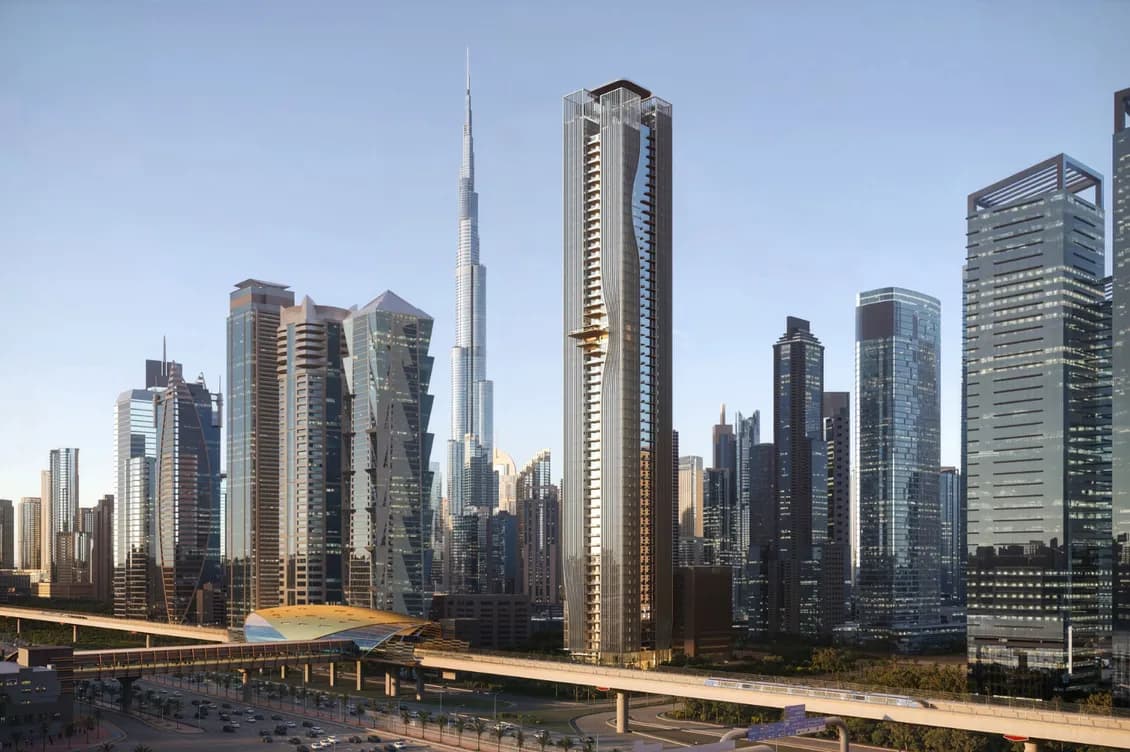 Futuristic city skyline with gleaming glass skyscrapers, including a slender central tower, and elevated highways under a clear blue sky.