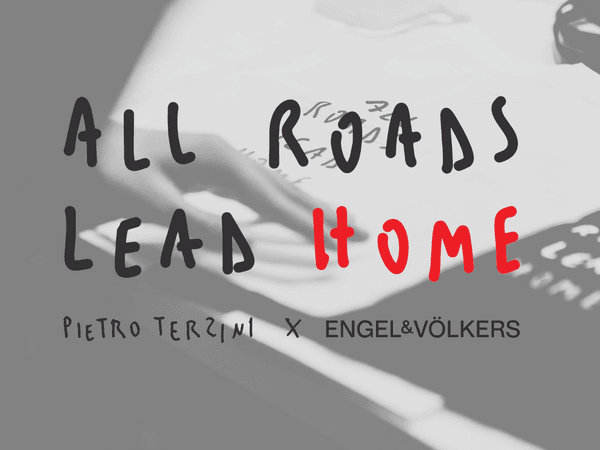 Scritta su sfondo sfocato grigio che dice "ALL ROADS LEAD HOME" con la parola "HOME" in rosso. Sotto, il testo "PIETRO TERZINI X ENGEL & VÖLKERS"