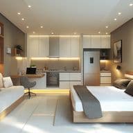 Contemporary studio apartment featuring an integrated living and sleeping area with a white kitchen. The space includes a platform bed with gray accents, built-in storage, ambient LED lighting, white kitchen cabinets, modern appliances, and indoor plants. The design maximizes space efficiency with a minimalist white and wood color scheme.