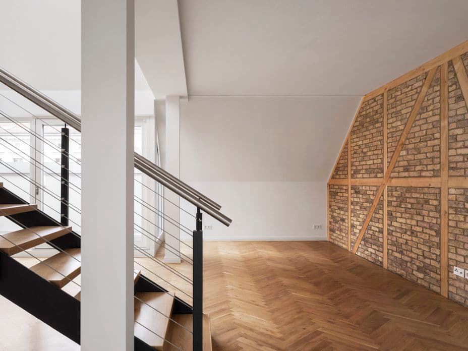 Bauensemble Hagelberger Straße Wohnzimmer mit Treppe