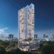 A modern, illuminated high-rise building at night, surrounded by city lights and palm trees, with a starry sky overhead.