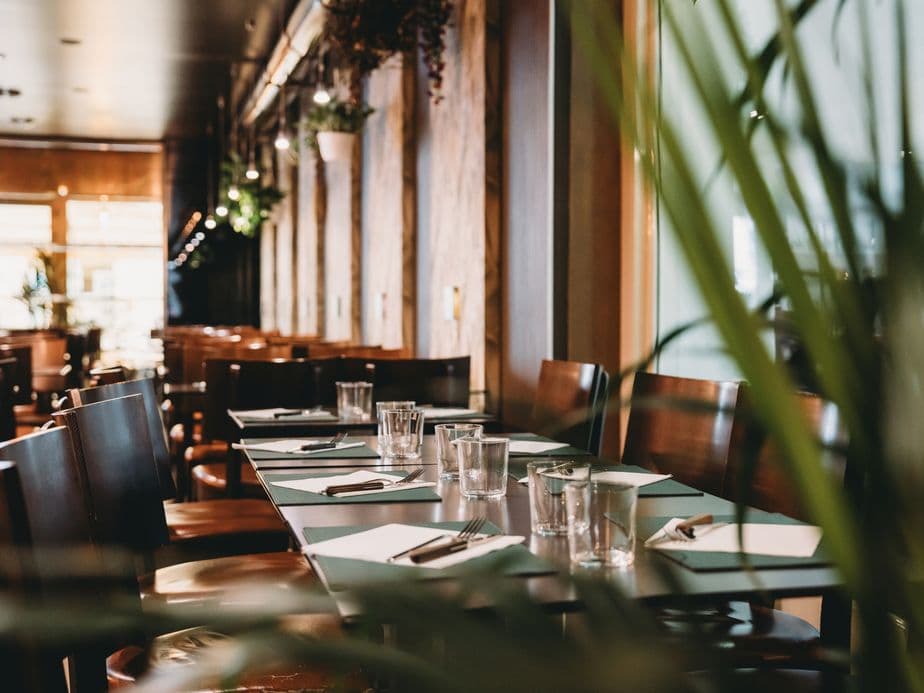 Modern restaurant interior in Mallorca with elegant dining area and warm ambient lighting