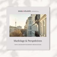 Cover of a real estate brochure showing a city street view with trees and buildings, and a distant landmark tower under a clear sky.