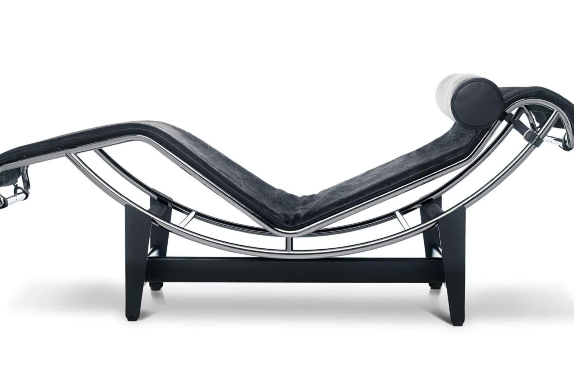 Modern black chaise lounge with a curved metal frame and cushioned surface on a white background.