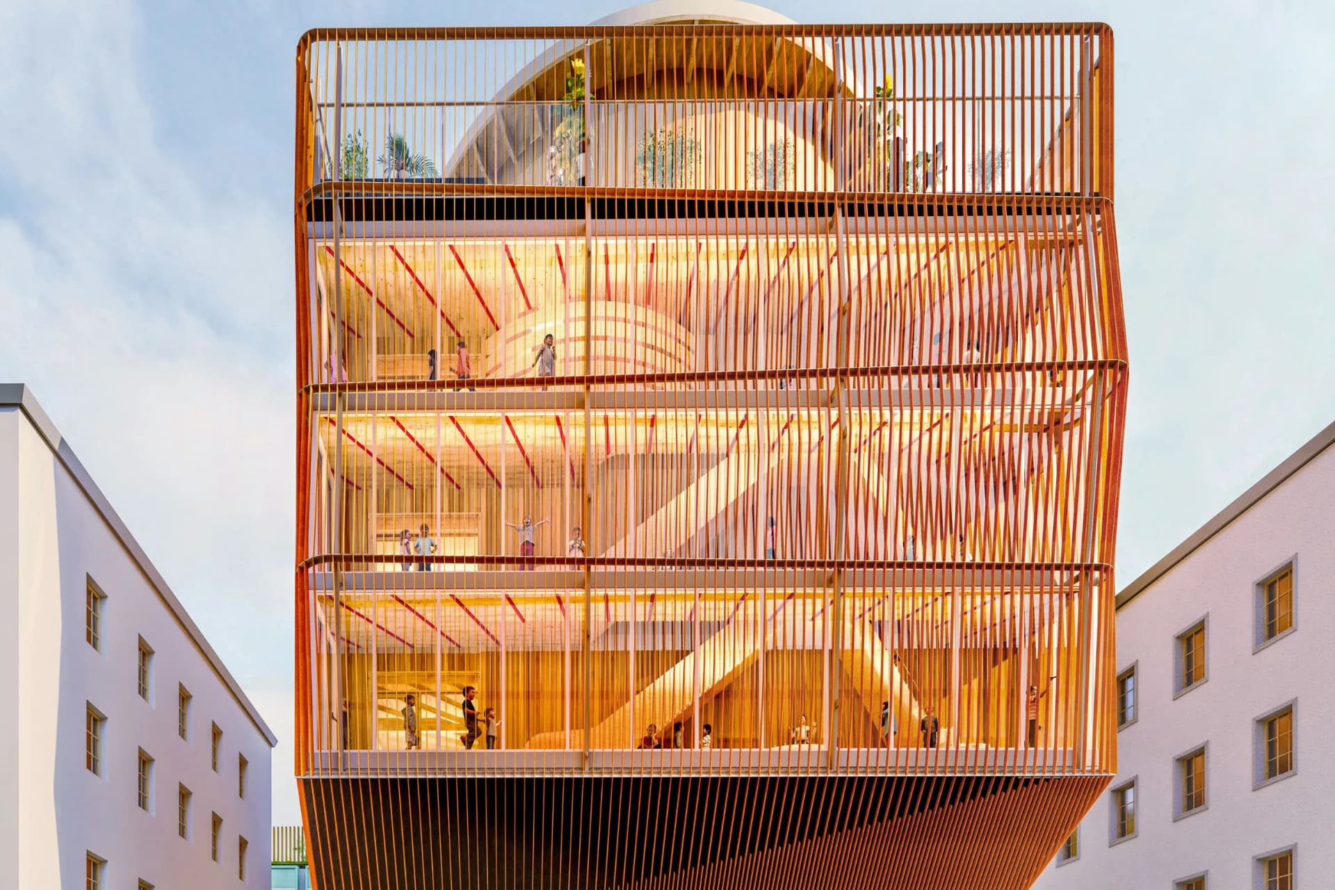 An orange, multi-story glass pavilion with a cage-like frame and curved interior, perched between two white buildings.