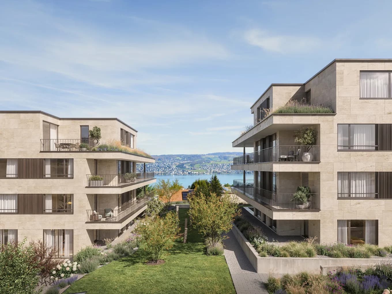 Zwei moderne Wohnhäuser mit Terrassen und Weitblick.