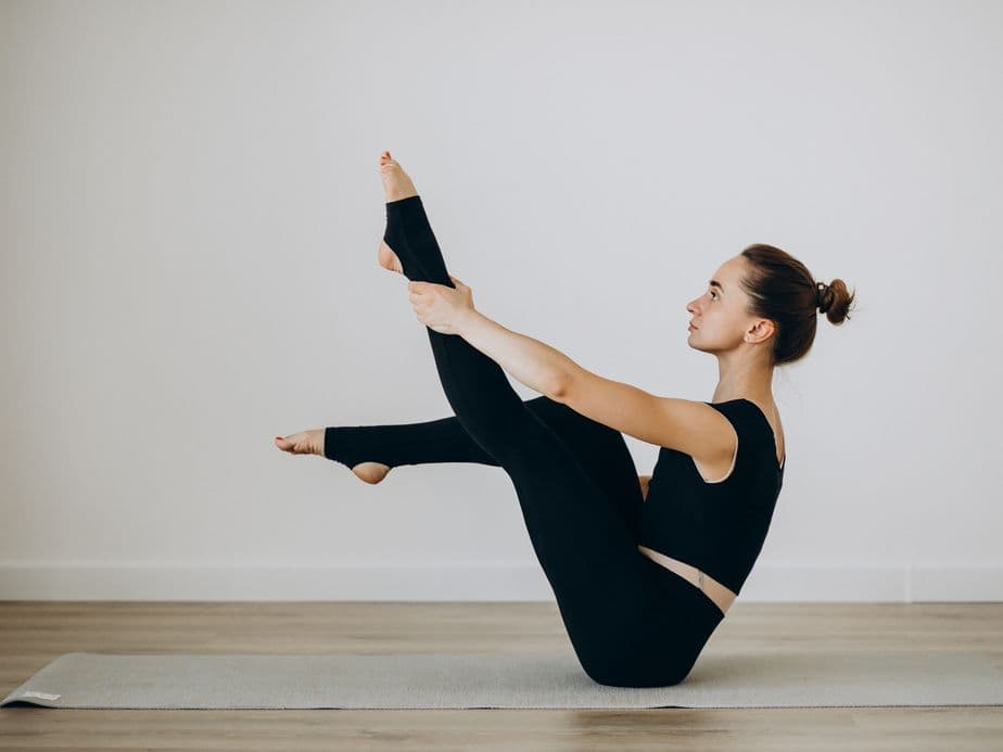 woman-practice-pilates-yoga-gym