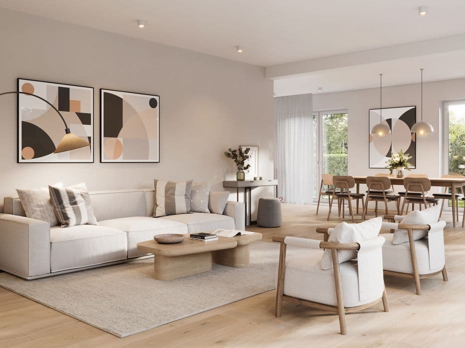 Bright, modern living room with wooden flooring, designer furniture and view into the open-plan dining area of a property