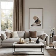 Elegant living room with modern furnishings, example of property preparation before sale.