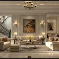 Elegant white-paneled living room with a crystal chandelier, two beige sofas around a glass coffee table, large windows, and a grand staircase.