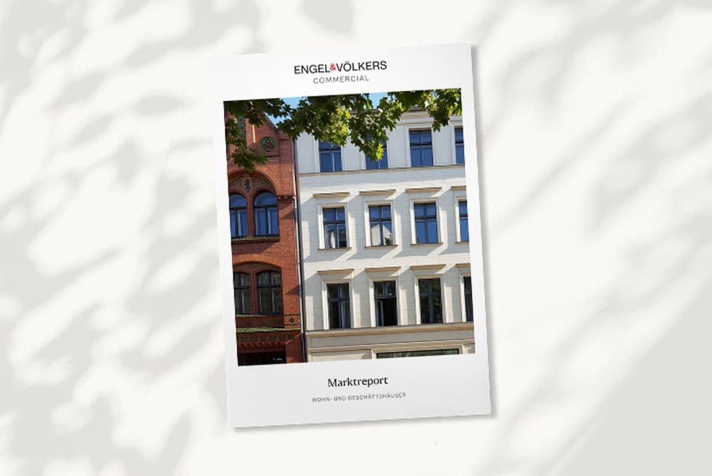 Market report cover featuring a photo of elegant, classic buildings under a clear sky, with leaves casting shadows.