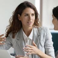 Real estate agent meeting client to discuss the benefits of an exclusive listing agreement