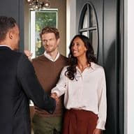 Customers welcome advisors at their front door