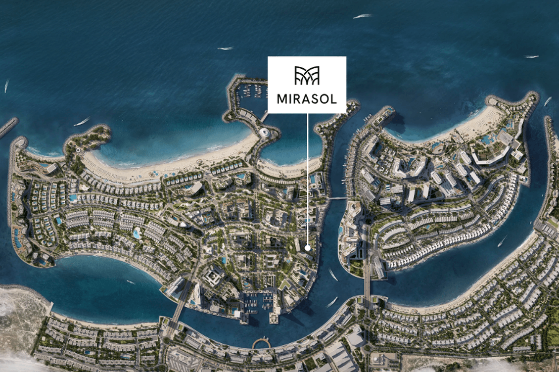Aerial view of a coastal development labeled "Mirasol," featuring residential areas, waterways, and beachfront, surrounded by the ocean.